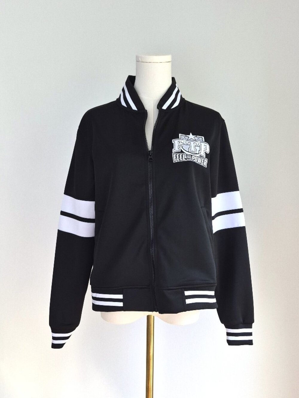 Black cheerleading varsity jacket
